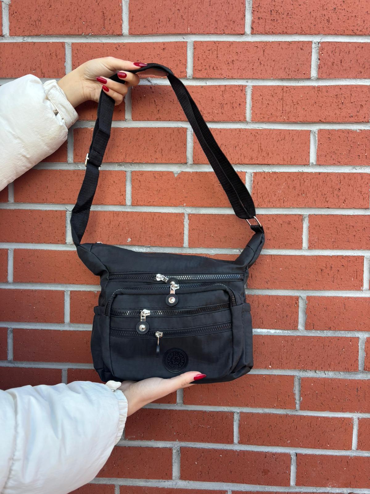 Siyah Tonlarında Çok Gözlü Omuz Çantası